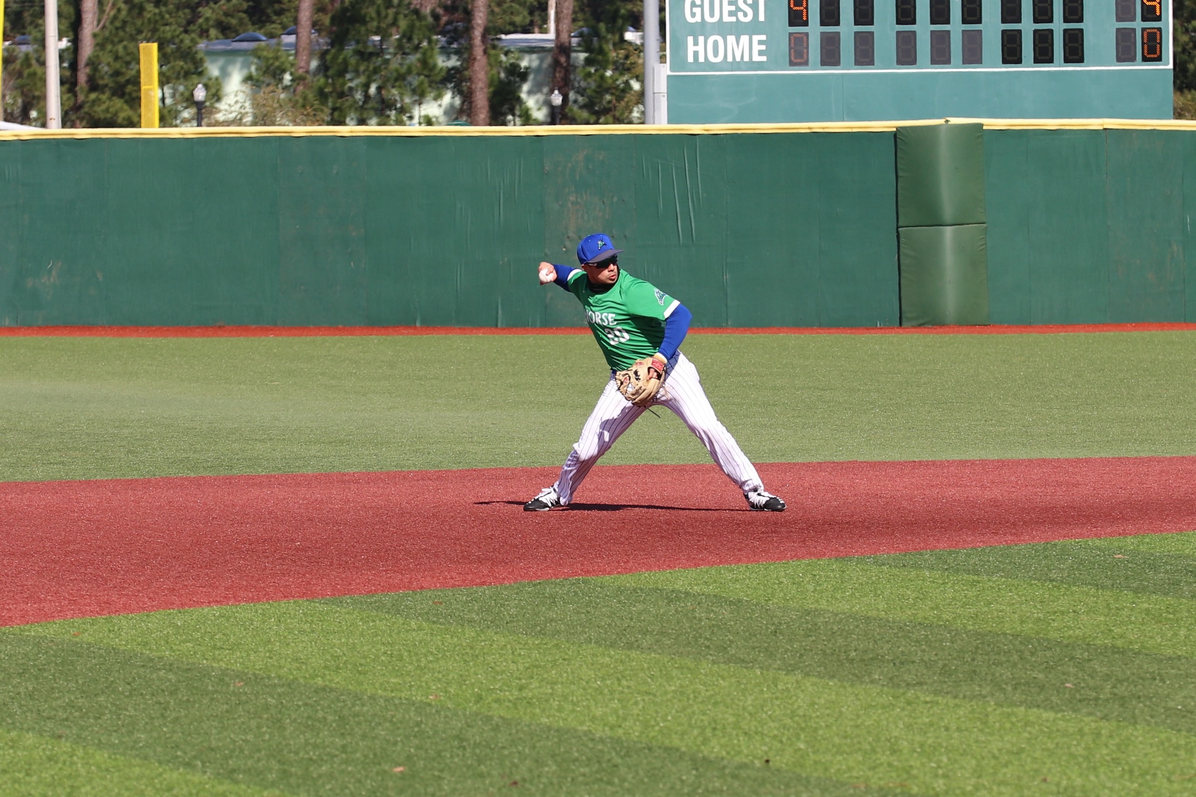 Hector Arauayan throws the ball from shortstop