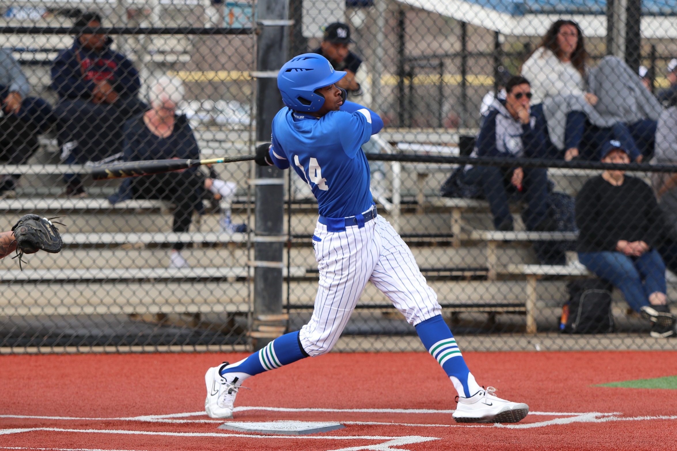 Zach Gibson finishes a swing at the plate