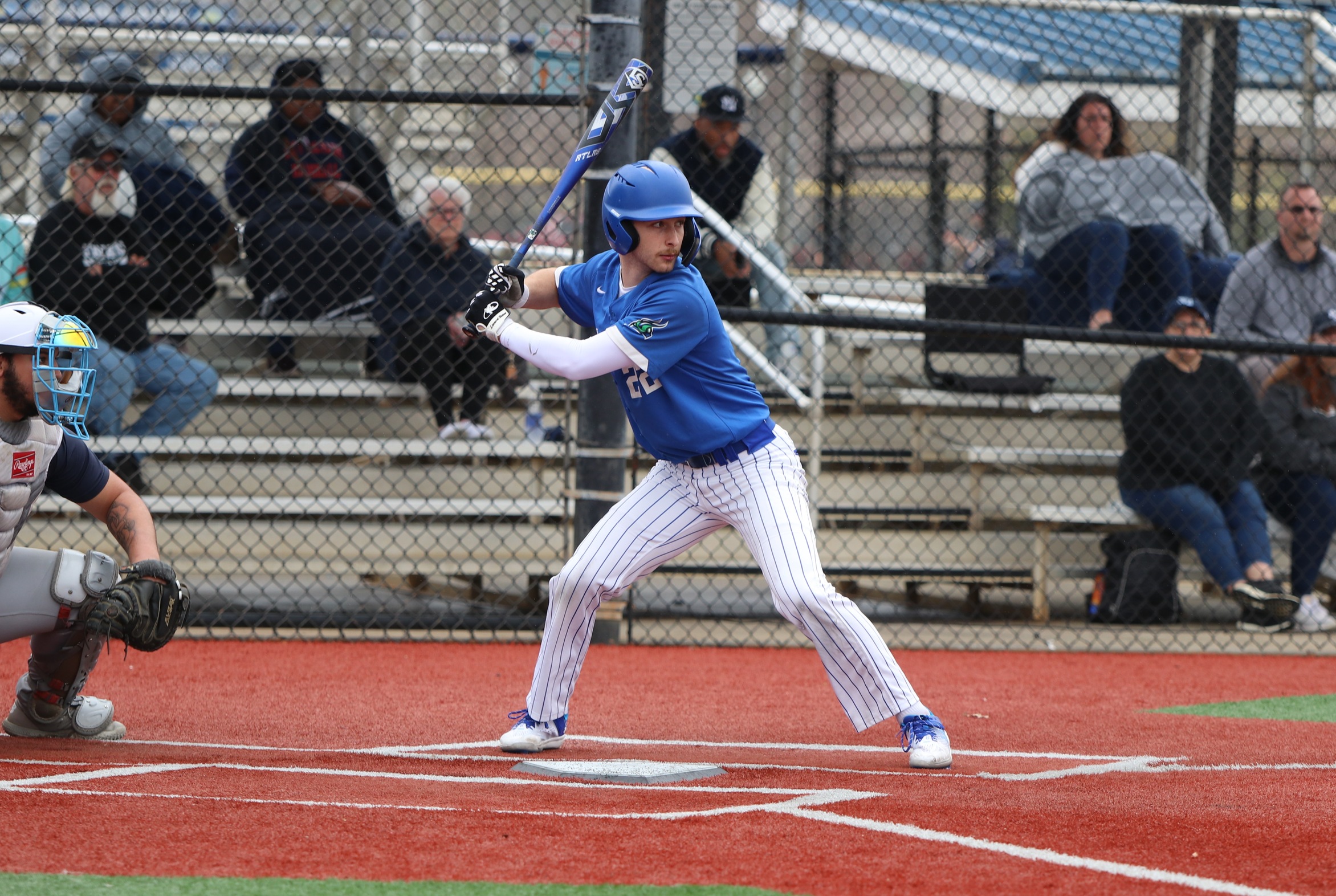 Zac Gomersall in the batters box striding as the pitch comes in