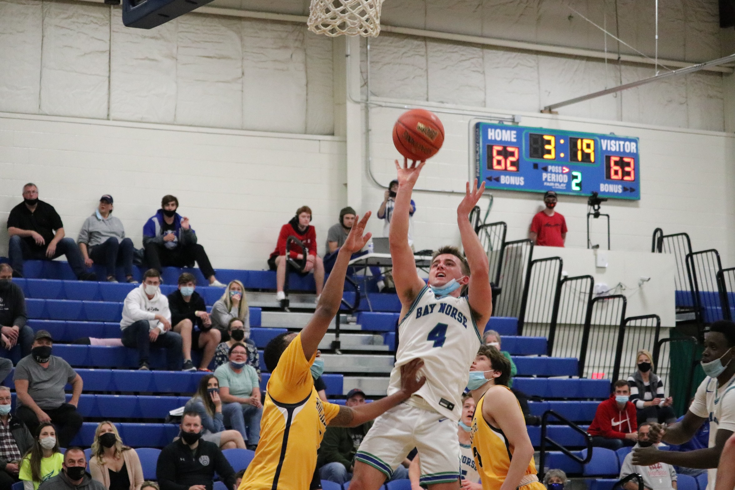 Marcus Johnson releasing a shot in the lane.