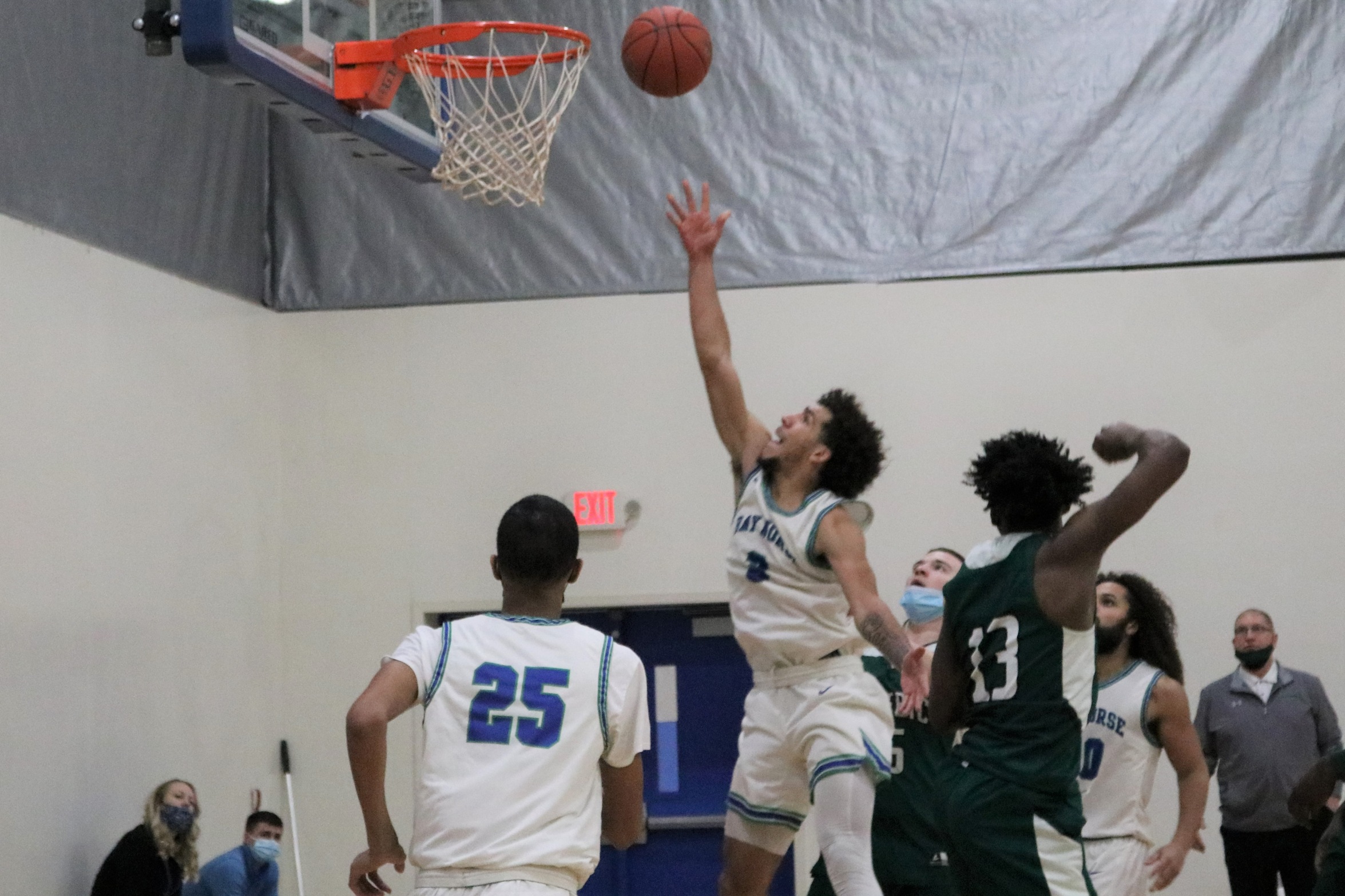 Tre Burris releases a shot in the lane