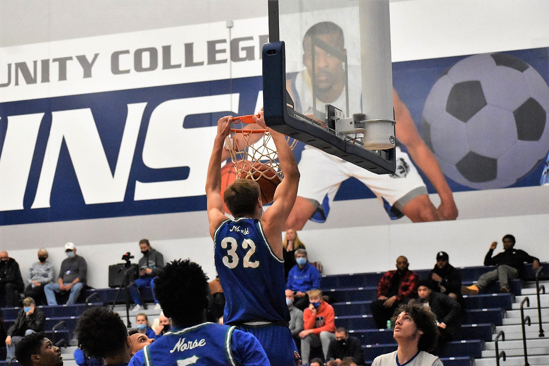 Justin Nelson dunks the ball