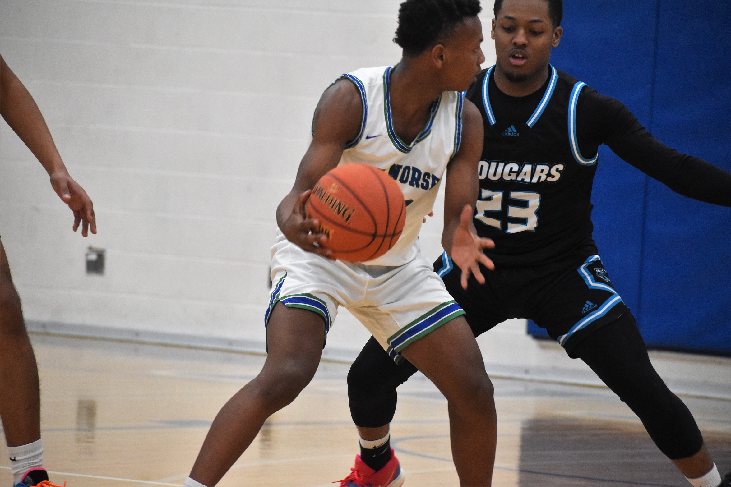 The Norse player with the ball in the post