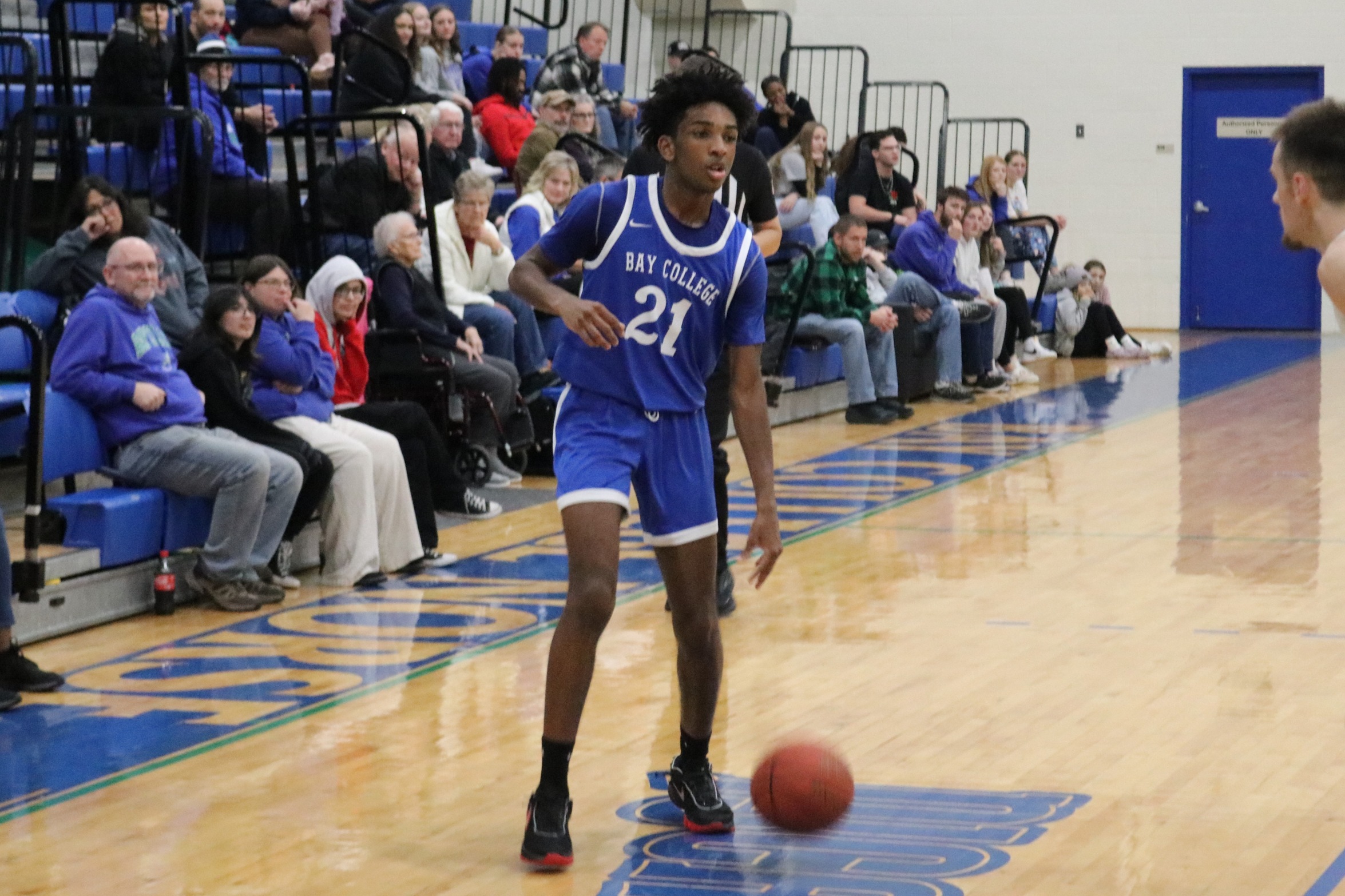 Nic Williams dribbles out near the three point line