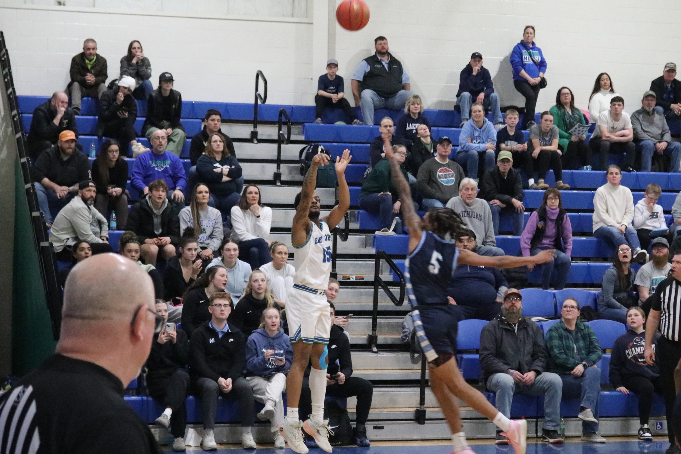 KaiRee Gadson lets a three-pointer go from the corner as a defender is late to close out