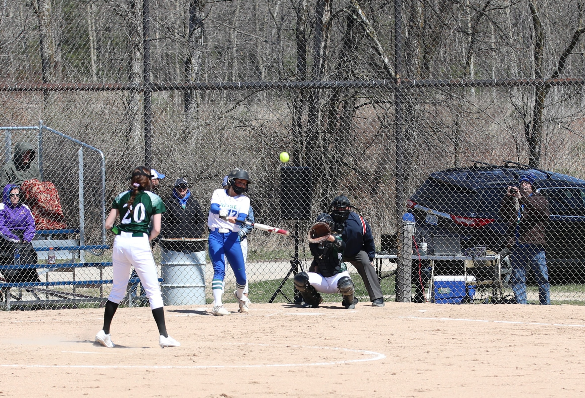Jenna Tardiff mid swing, driving a ball