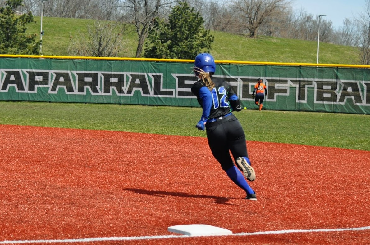 Avery Sorochan rounds first, looking on at the ball in right as she goes for one of her five doubles on the day.