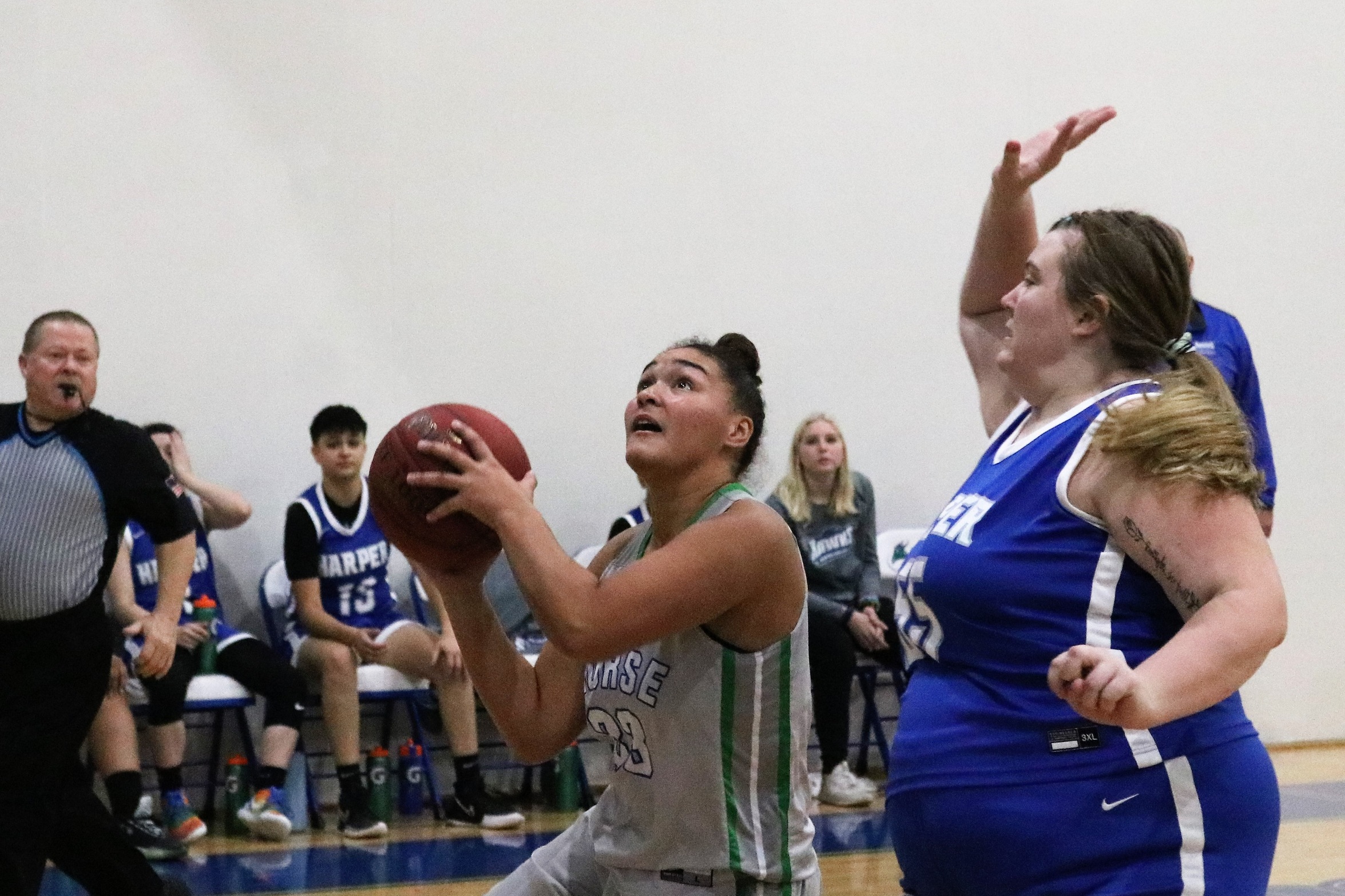 Tiana Taylor goes up for a layup with a defender closing in