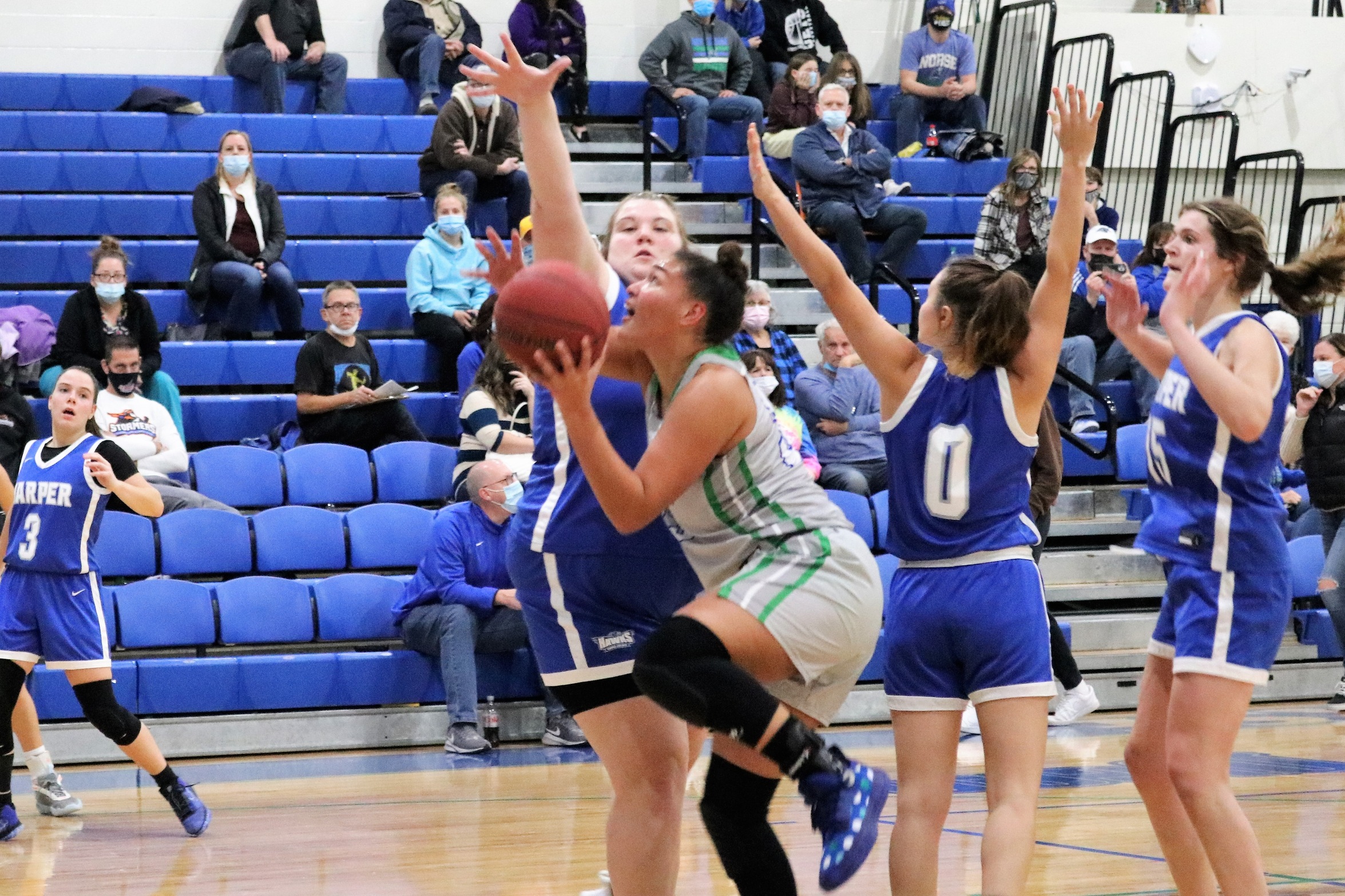 Tiana Taylor putting up a shot with a defender close
