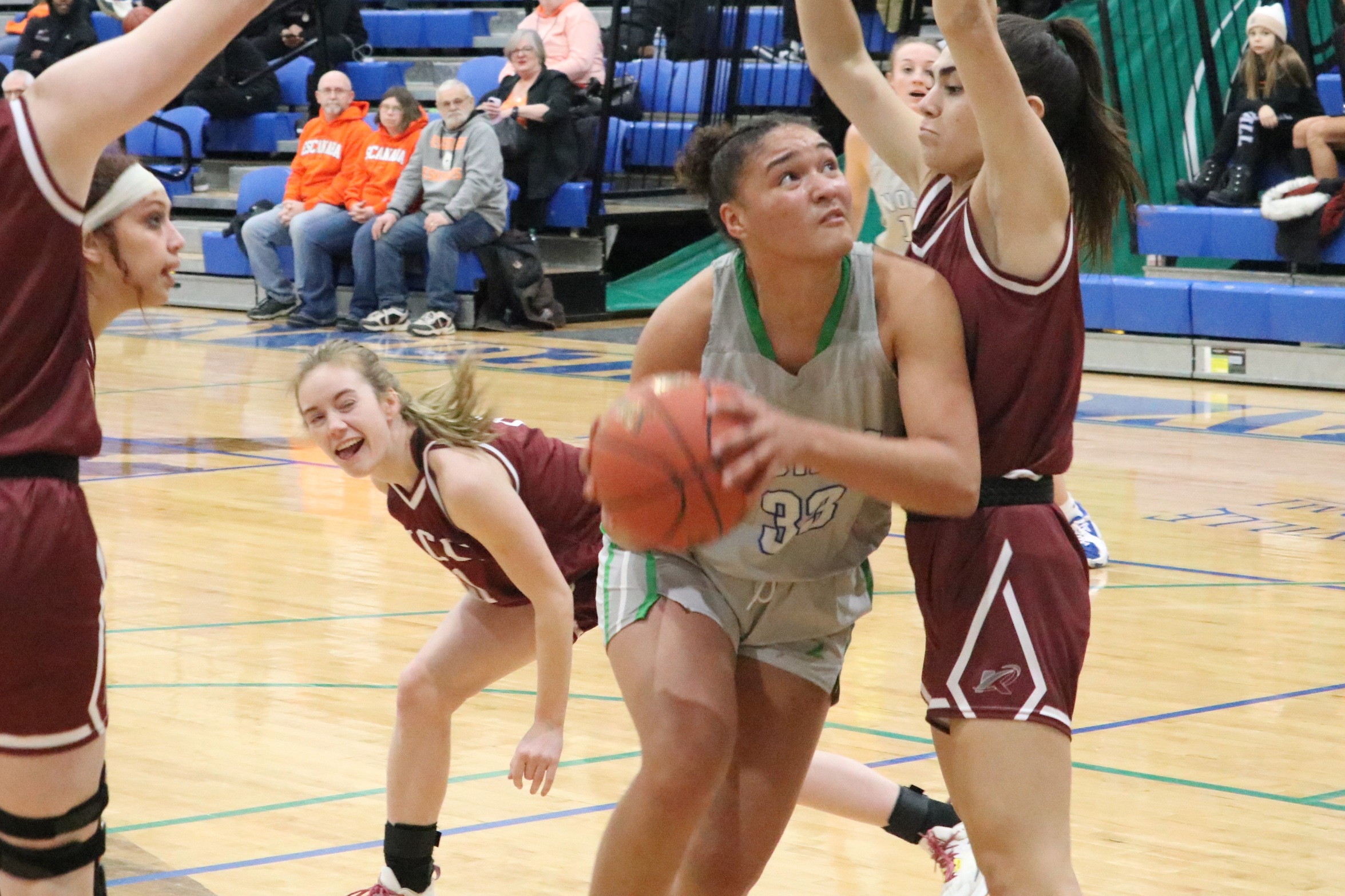 Tianna Taylor going around a defender to shoot