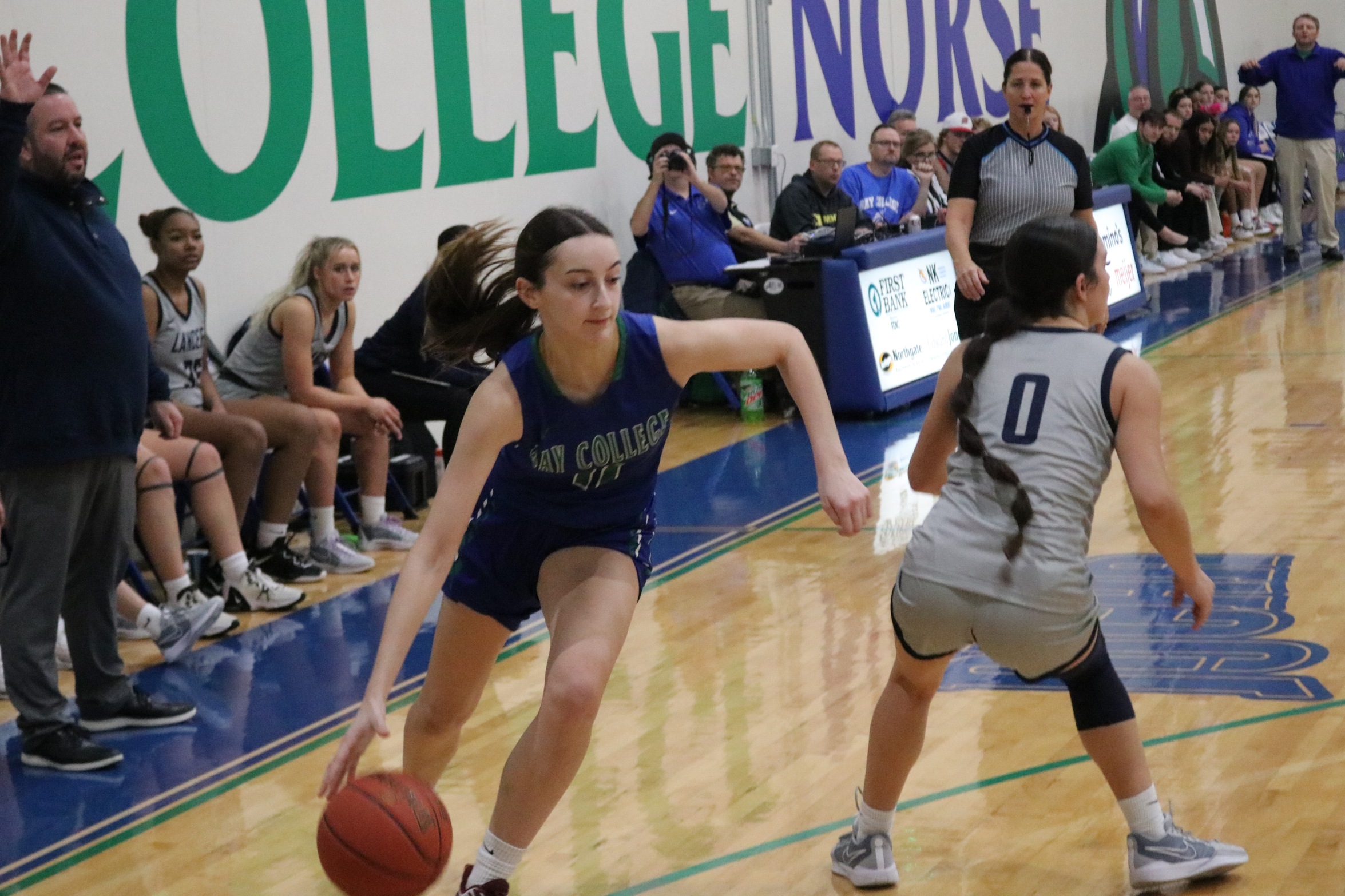 Kennedy Sproule dribbles around a defender