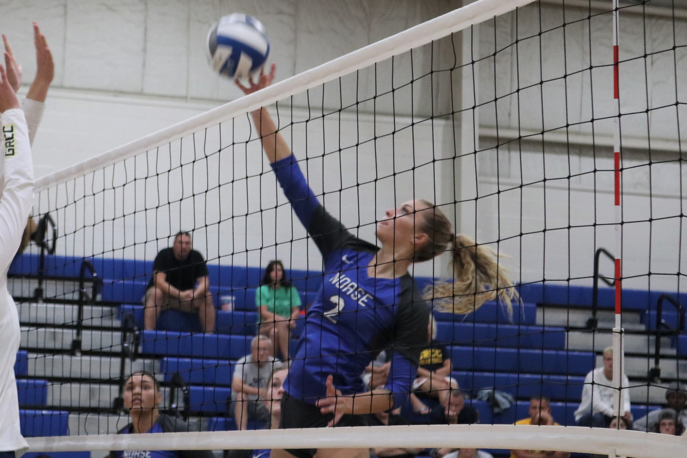 Riley Johnson with an attack at the net