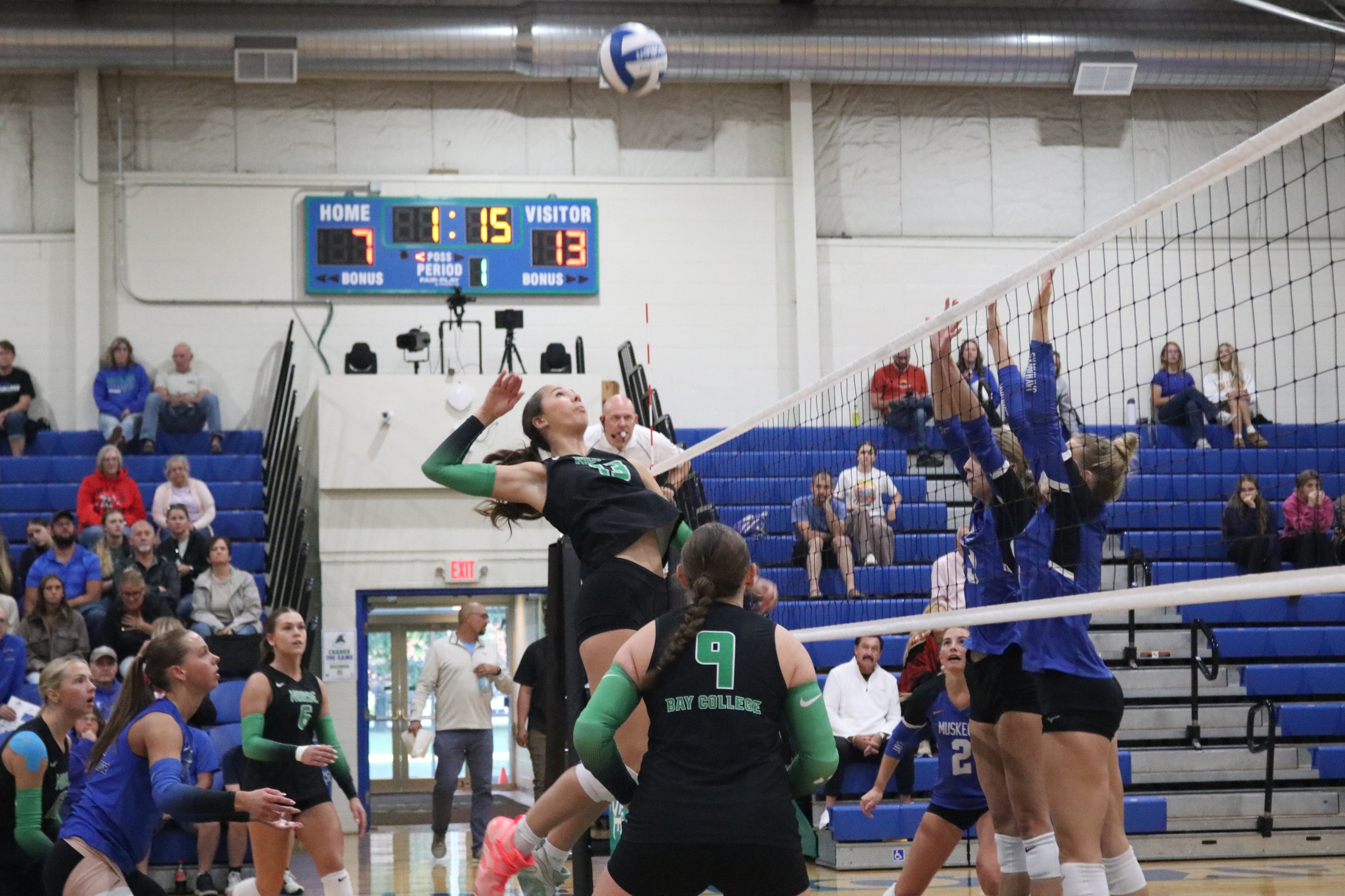 Haylee Gatien goes up to attempt a kill