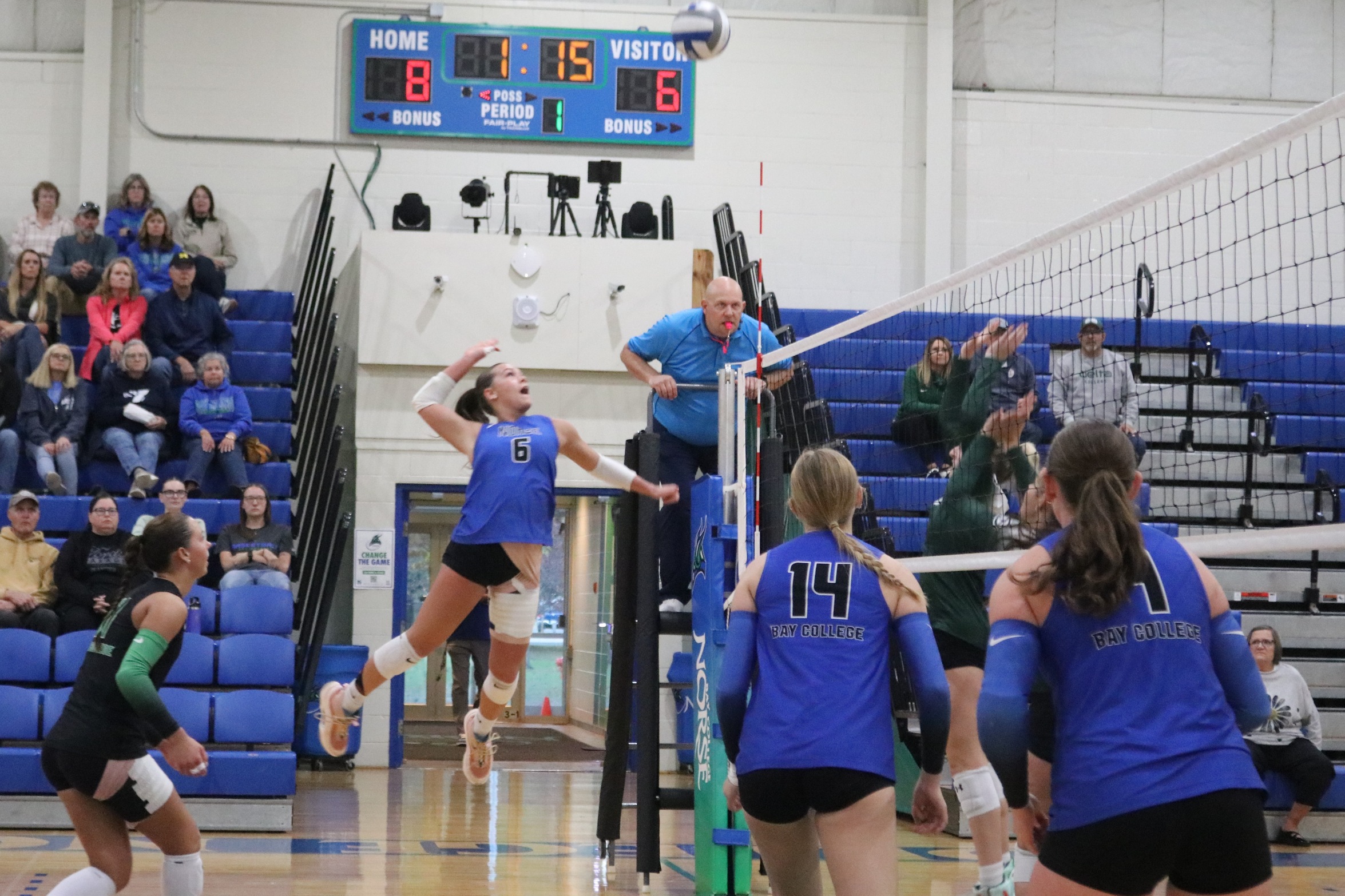 Mia Hauser goes up for a hit